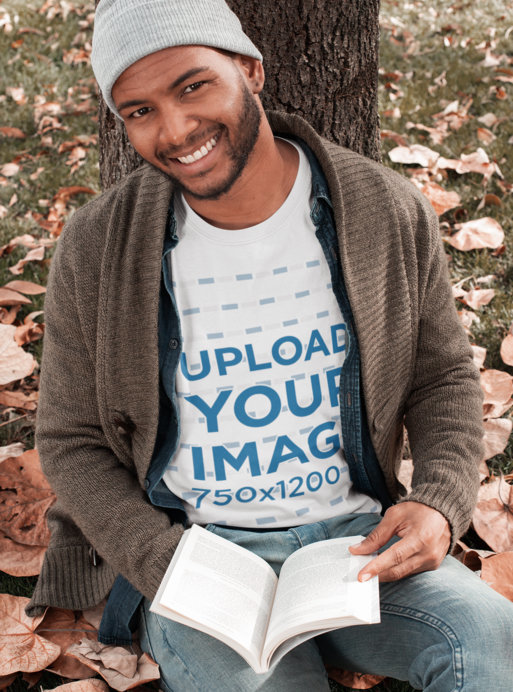 T-Shirt Mockup of a Man Reading in the Woods
