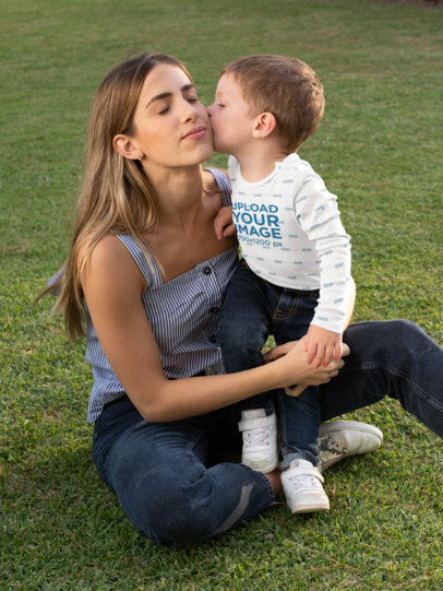 Long Sleeve Onesie Mockup Featuring a Boy Kissing His Mother 