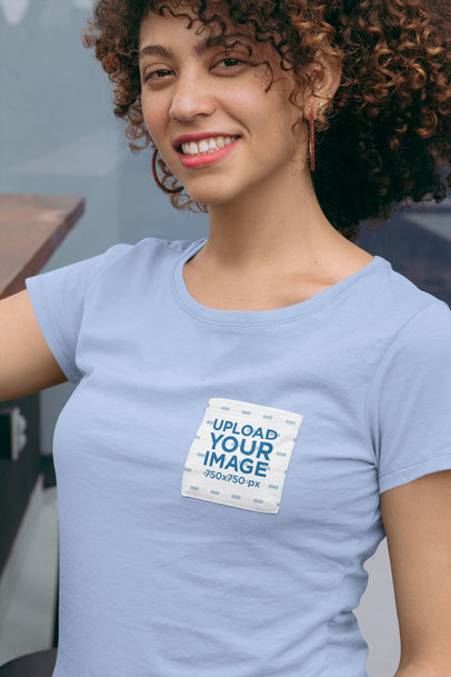 Mockup of a Woman Wearing a Tee with a Customizable Front Pocket