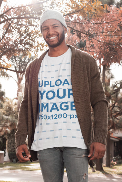 Mockup of a Bearded Man Wearing a Customizable T-Shirt in the Park in Autumn 
