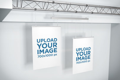 Mockup of Two Posters Hanging from a Ceiling Frame 