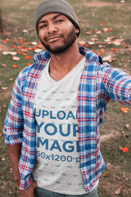 T-Shirt Mockup of a Bearded Man Taking a Selfie in the Park 