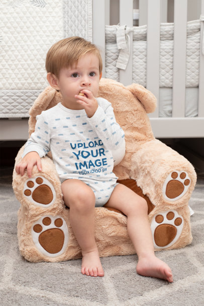 Heathered Onesie Mockup of a Little Boy Sitting on a Teddy Bear Chair 29999