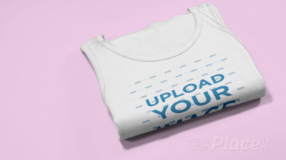 Video of a Folded Tank Top Placed on a Surface by Someone 30248