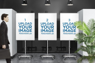 Mockup of Three Posters Placed on Display Stands