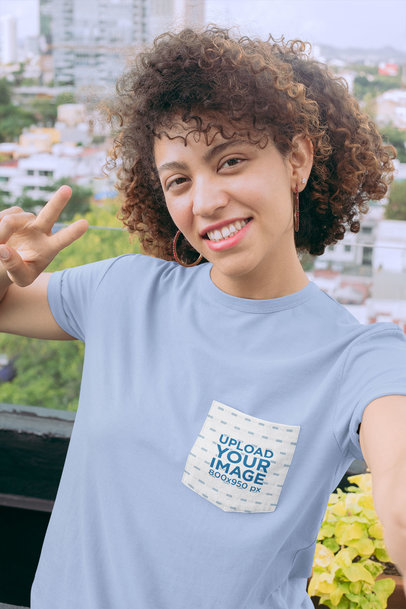 Selfie Mockup of a Woman Wearing a Pocket Tee