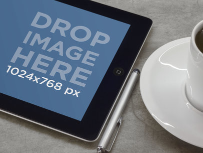 iPad Mockup Featuring a Concrete Table 