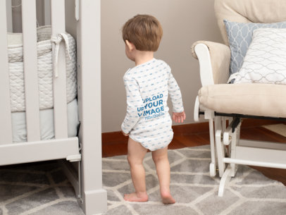 Back View Mockup of a Baby Wearing a Sublimated Onesie 