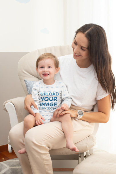 Mockup of a Baby with a Heathered Long Sleeve Onesie Sitting on His Mother's Lap