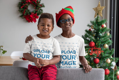 Mockup of Two Brothers Wearing Christmas T-Shirts 