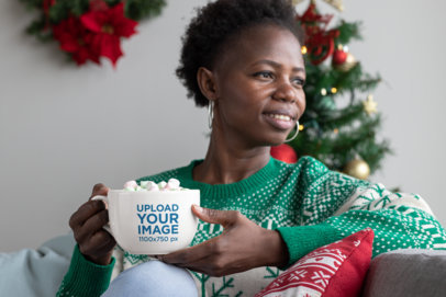 Mockup of a Woman Having a Hot Cocoa With Marshmallows in a 24 oz Mug 30348
