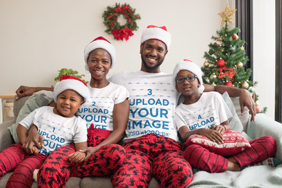 Mockup of a Family of Four Wearing Matching T-Shirts in Christmas 