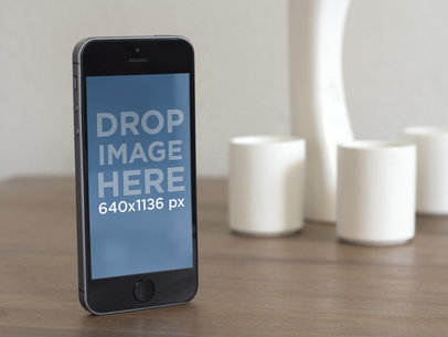 iPhone Portrait Next To White Vases