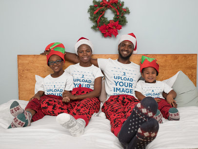 X-Mas Mockup of a Family with Matching T-Shirts in the Bedroom