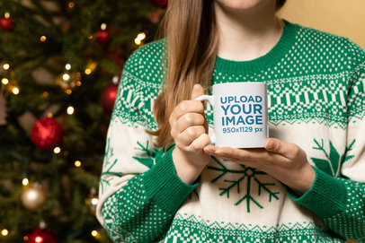 Christmas Mockup of a Woman Holding an 11 oz Coffee Mug