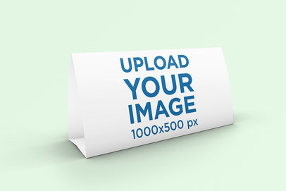 Minimalist Mockup of a Desk Calendar with a Plain Color Backdrop