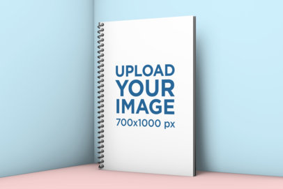 Spiral Notebook Mockup Standing Against a Solid Surface 1006-el