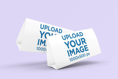 Mockup of Two Desk Calendars Leaning in a Minimalistic Scenario