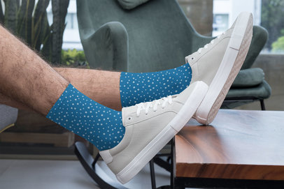 Sublimated Socks Mockup Featuring a Man with His Legs Over a Low Table 29547