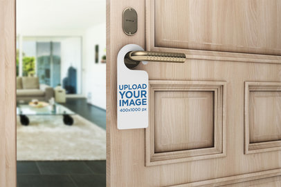 Mockup of a Door Hanger on a Open Room Door