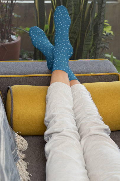 Socks Mockup of a Woman Lying on a Couch with Her Feet Up 29526