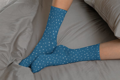 Socks Mockup of a Woman Sitting on a Bed 29538