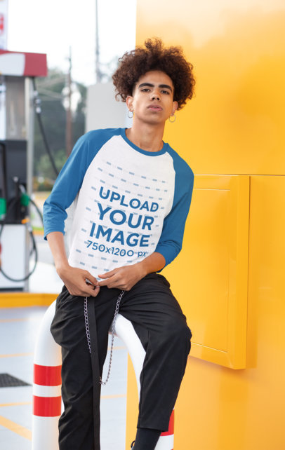 Mockup of a Man in a Gas Station Wearing a Raglan Tee with Tree-Quarter Sleeves 30207