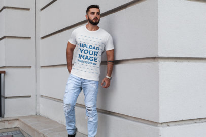T-Shirt Mockup of a Bearded Man with an Arm Tattoo