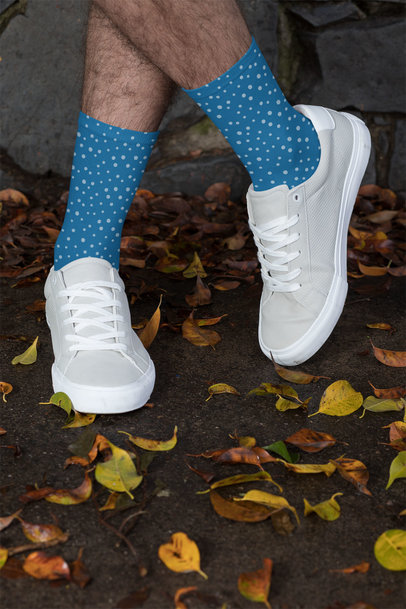Socks Mockup Featuring a Man with Crossed Legs by Some Fall Leaves 29554