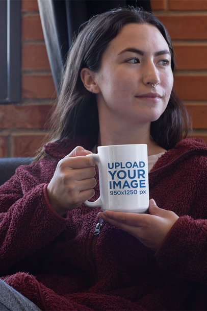 Mockup of a Distracted Young Woman Holding a 15 oz Coffee Mug 