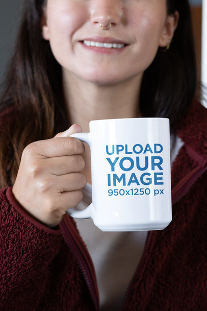 Mockup of a Woman with a Nose Piercing Holding a 15 oz Coffee Mug
