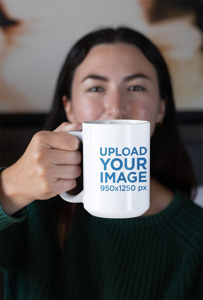 Mockup of a Woman Showing a 15 oz Mug