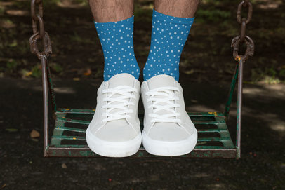 Sublimated Socks Mockup Featuring a Man Standing on a Swing 29557