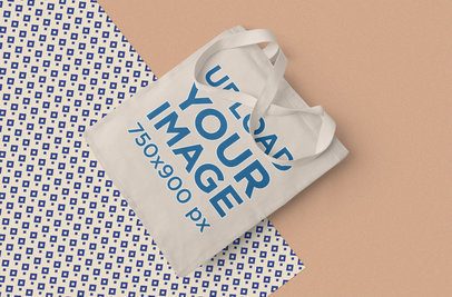 Tote Bag Mockup Featuring a Patterned Background 