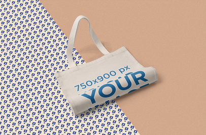 Cotton Tote Bag Mockup Placed over Different Fabrics 1060-el