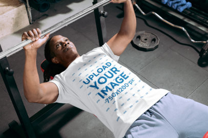 Jersey Mockup Featuring a Man Doing Bench Press Workout at a Gym
