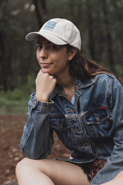 Dad Hat Mockup of a Woman Sitting in Nature