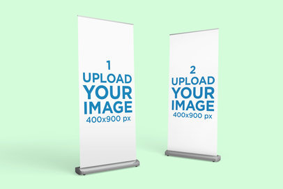 Mockup of Two Roll-Up Banners Standing Against a Solid Color Backdrop