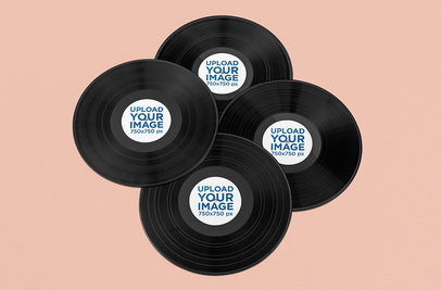 Mockup Featuring Four Vinyl Records Lying on a Solid Color Surface 1040-el