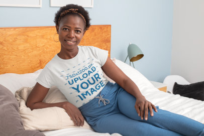 Mockup of a Woman with a Crewneck T-Shirt Lying in Bed 