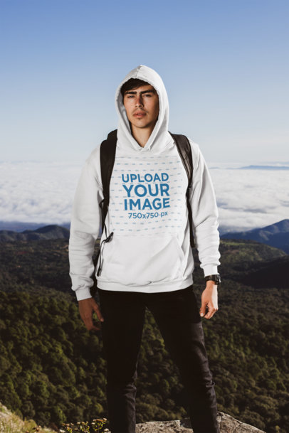 Pullover Hoodie of a Man Hiking a Mountain