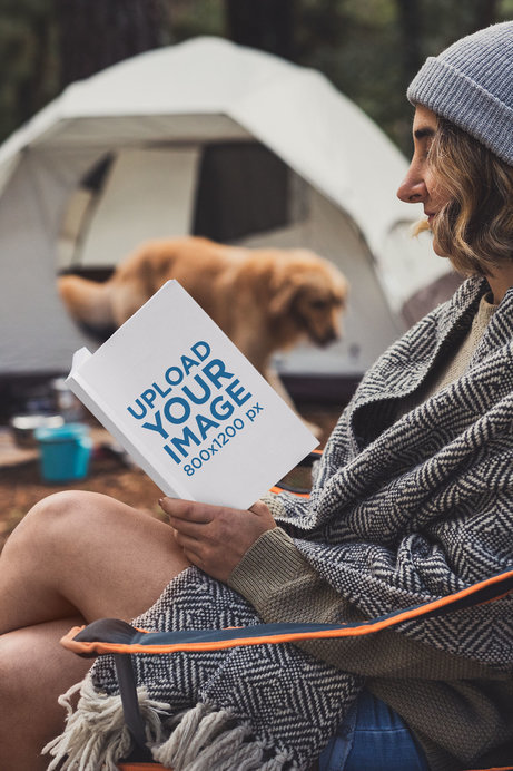 Book Mockup of a Young Woman Camping with Her Dog 