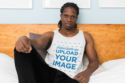 Heathered Tank Top Mockup Featuring a Man Lying on a Bed