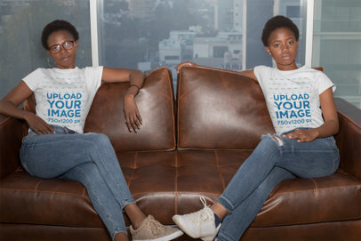 T-Shirt Mockup of Mother and Daughter Sitting on a Couch