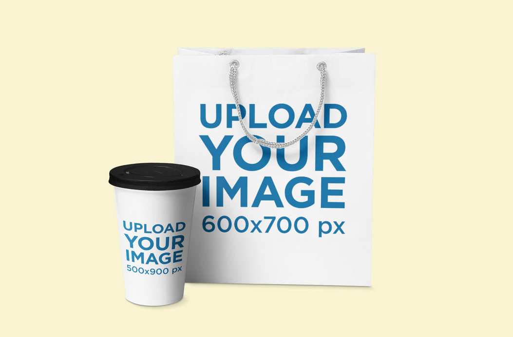 Mockup Featuring a Coffee Cup and a Gift Bag Placed Against a Solid Color Background 