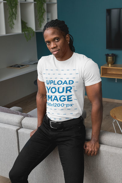 Crewneck T-Shirt Mockup of a Man in a Living Room 