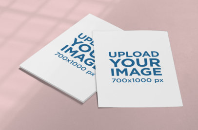 Mockup Featuring Two Letterheads Placed on a Solid Color Surface 