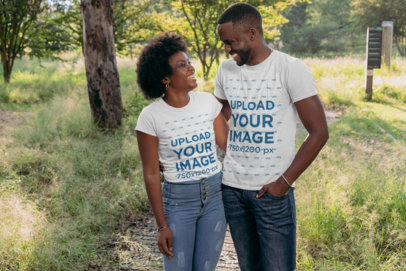 T-Shirt Mockup of a Happy Couple in Nature