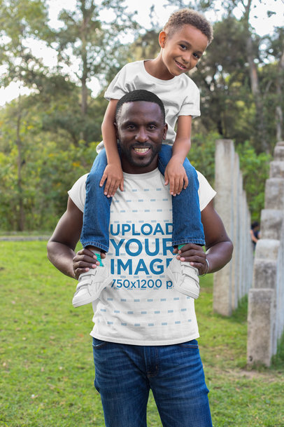 T-Shirt Mockup of a Dad and His Son at a Park 