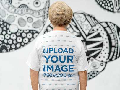 Back of a Senior Lady Wearing a Tshirt Mockup in an Urban Space